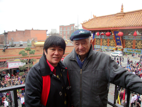 Charlayne Thornton-Joe with her father, John Joe, at the Chinese New Year's celebrations in Chinatown, February 2013. Photo courtesy of Charlayne Thornton-Joe.