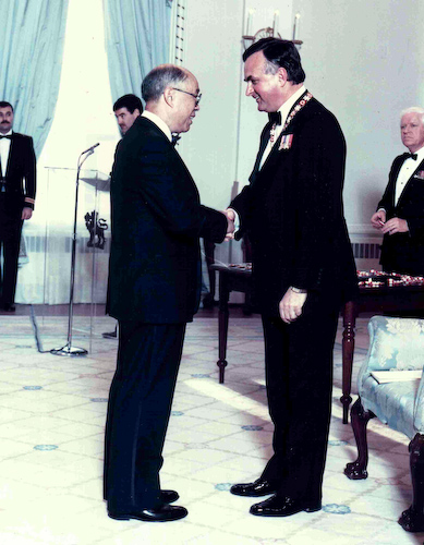 Jack Lee receiving the Order of Canada from Governor General Ray Hnatyshyn in 1989 (Photo courtesy of Robert Lee).