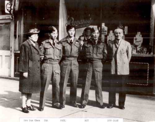 Standing in front of the Panama Cafe are Koo Ching Lim (left) and her husband Chan Dun (right) with three of their four sons who served in the Second World War, from left: Ira, Paul, and Roy (Photo courtesy of Anthony Chan).
